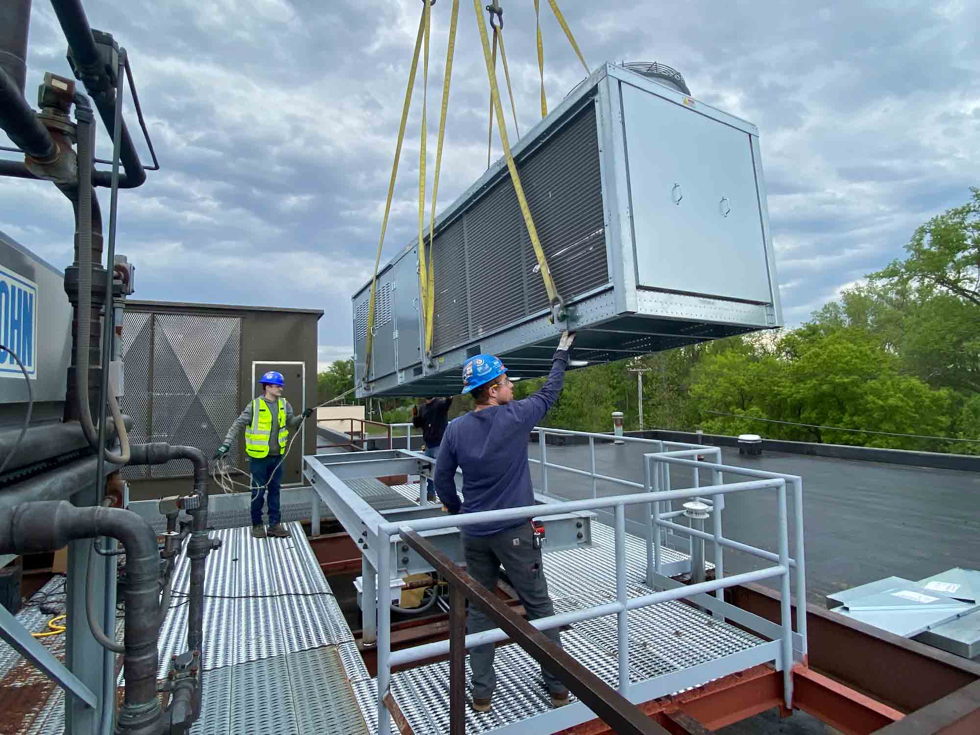 two-men-guiding-equipment